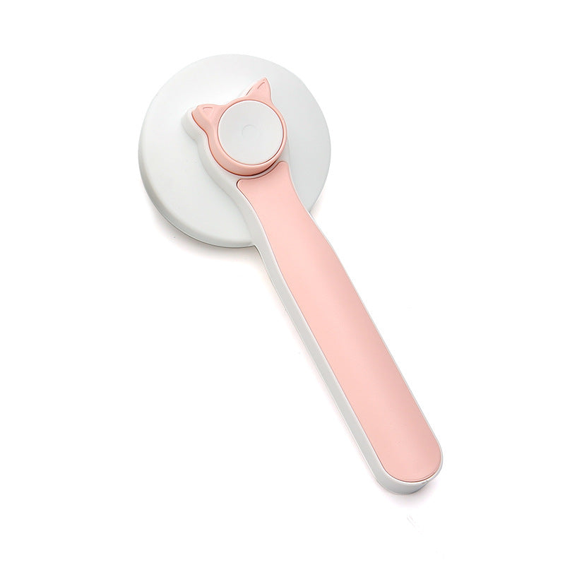 Pink self-cleaning slicker brush with cat-ear button